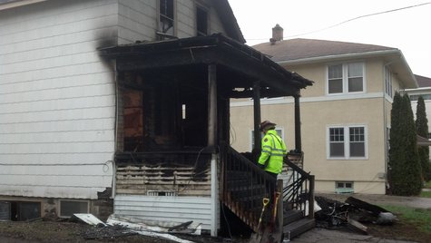 Investigators at scene of fire Monday, May 19, 2014 in North Fargo Investigators at scene of fire Monday, May 19, 2014 in North Fargo