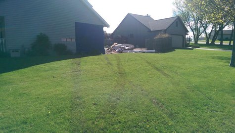 Truck tire marks seen as it drove into an east side Green Bay home on Wednesday May 21, 2014. (Copyright Midwest Communications, Inc.) Truck tire marks seen as it drove into an east side Green Bay home on Wednesday May 21, 2014. (Copyright Midwest Communications, Inc.)