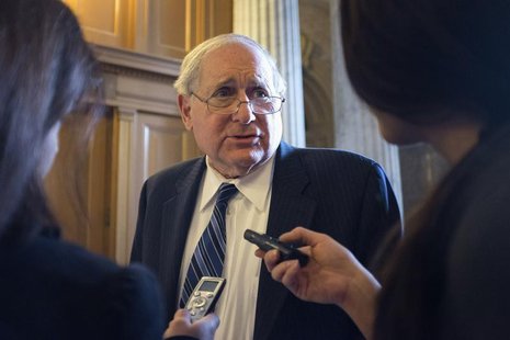 Senator Carl Levin (D-MI) speaks to reporters as he arrives for the Democratic weekly policy luncheon on Capitol Hill in Washington January Senator Carl Levin (D-MI) speaks to reporters as he arrives for the Democratic weekly policy luncheon on Capitol Hill in Washington January