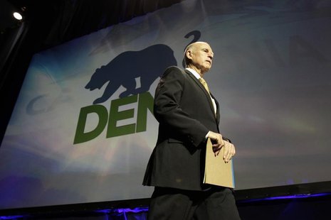 California Governor Jerry Brown walks onstage to speak at the 2014 California Democrats State Convention at the Los Angeles Convention Cente California Governor Jerry Brown walks onstage to speak at the 2014 California Democrats State Convention at the Los Angeles Convention Cente