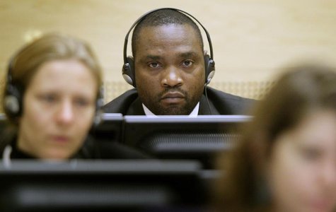 Congolese warlords Germain Katanga sits in the courtroom of the International Criminal Court in The Hague November 24, 2009. REUTERS/Michael Congolese warlords Germain Katanga sits in the courtroom of the International Criminal Court in The Hague November 24, 2009. REUTERS/Michael