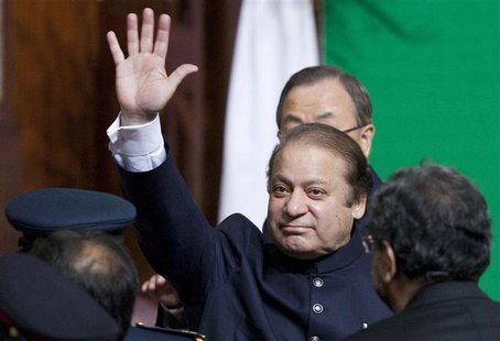 Pakistan's Prime Minister Nawaz Sharif waves to the crowd as he leaves after attending a flag raising ceremony to mark the country's 67th In Pakistan's Prime Minister Nawaz Sharif waves to the crowd as he leaves after attending a flag raising ceremony to mark the country's 67th In