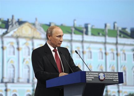 Russia's President Vladimir Putin speaks during a session of the St. Petersburg International Economic Forum 2014 (SPIEF 2014) in St. Peters Russia's President Vladimir Putin speaks during a session of the St. Petersburg International Economic Forum 2014 (SPIEF 2014) in St. Peters