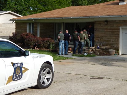 Police enter Armstrong home. photo provided by ISP Police enter Armstrong home. photo provided by ISP