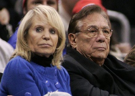 Los Angeles Clippers owner Donald Sterling (C), his wife Shelly (L) attend the NBA basketball game between the Toronto Raptors and the Los A Los Angeles Clippers owner Donald Sterling (C), his wife Shelly (L) attend the NBA basketball game between the Toronto Raptors and the Los A