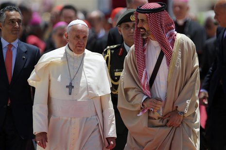 Pope Francis (2nd L) is welcomed by Jordan's Prince Ghazi bin Muhammad (R) upon his arrival at Queen Alia International airport in Amman May Pope Francis (2nd L) is welcomed by Jordan's Prince Ghazi bin Muhammad (R) upon his arrival at Queen Alia International airport in Amman May