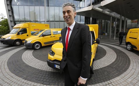 Frank Appel, CEO of German postal and logistics group Deutsche Post DHL poses in front of a StreetScooter E-car and other E-cars in Bonn May Frank Appel, CEO of German postal and logistics group Deutsche Post DHL poses in front of a StreetScooter E-car and other E-cars in Bonn May