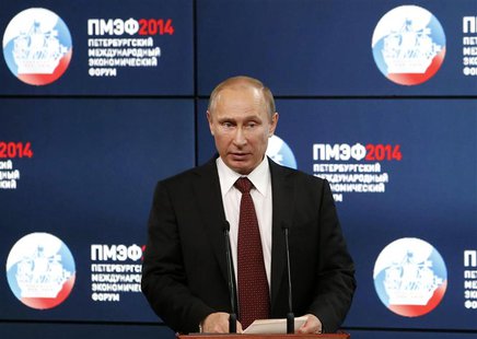 Russia's President Vladimir Putin delivers a speech during the "Oil and gas companies as an engine driving change in the world economy" sess Russia's President Vladimir Putin delivers a speech during the "Oil and gas companies as an engine driving change in the world economy" sess