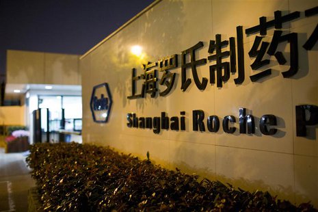 The logo of Shanghai Roche Pharmaceutical Co. Ltd. is seen outside their headquarters in Shanghai May 22, 2014. REUTERS/Aly Song The logo of Shanghai Roche Pharmaceutical Co. Ltd. is seen outside their headquarters in Shanghai May 22, 2014. REUTERS/Aly Song