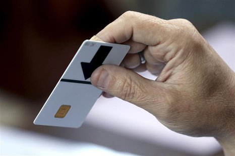 A man casts his vote for the European Parliament and Belgium's general elections in Deurne near Antwerp May 25, 2014. REUTERS/Francois Lenoi A man casts his vote for the European Parliament and Belgium's general elections in Deurne near Antwerp May 25, 2014. REUTERS/Francois Lenoi
