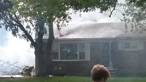 A fire strikes a Dartmouth Avenue house in the Holland Heights neighborhood on May 26, 2014. A fire strikes a Dartmouth Avenue house in the Holland Heights neighborhood on May 26, 2014.