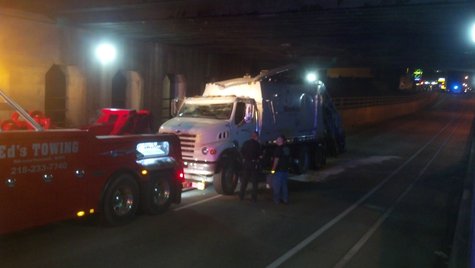 Truck hits underpass Truck hits underpass