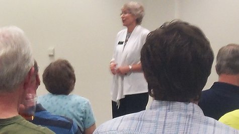 Library Executive Director Ann Rohrbaugh addresses the crowd of several dozen who turned out for the grand opening of the new center. Library Executive Director Ann Rohrbaugh addresses the crowd of several dozen who turned out for the grand opening of the new center.
