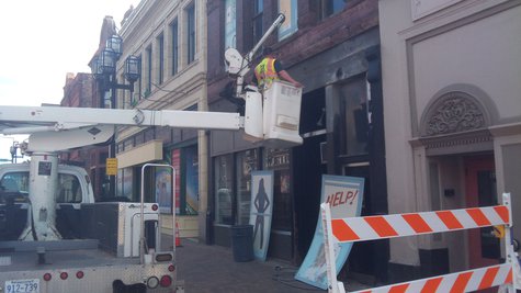Last Place On Earth signs being removed from the outside of the building Last Place On Earth signs being removed from the outside of the building