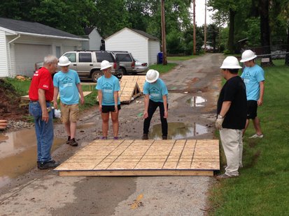 A group of students from 7 Fox Valley area high schools build a Habitat for Humanity House, June 2, 2014. (Photo from: FOX 11). A group of students from 7 Fox Valley area high schools build a Habitat for Humanity House, June 2, 2014. (Photo from: FOX 11).