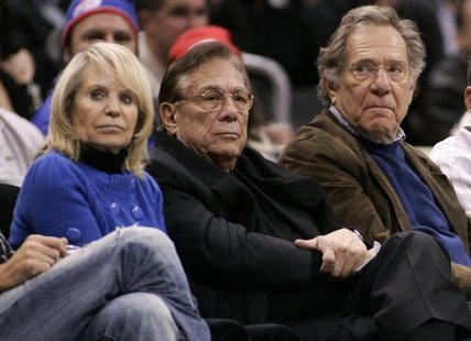 Los Angeles Clippers owner Donald Sterling (C), his wife Shelly (L) and actor George Segal attend the NBA basketball game between the Toronto Raptors and the Los Angeles Clippers at the Staples Center in Los Angeles, December 22, 2008.
CREDIT: REUTERS/DANNY MOLOSHOK Los Angeles Clippers owner Donald Sterling (C), his wife Shelly (L) and actor George Segal attend the NBA basketball game between the Toronto Raptors and the Los Angeles Clippers at the Staples Center in Los Angeles, December 22, 2008.
CREDIT: REUTERS/DANNY MOLOSHOK