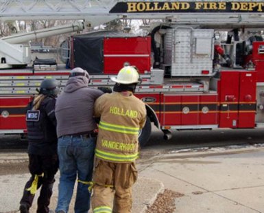 Holland Public Safety firefighters in action (photo courtesy Holland Dept. of Public Safety) Holland Public Safety firefighters in action (photo courtesy Holland Dept. of Public Safety)