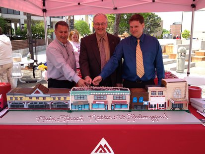 City of Sheboygan officials and a Benjamin Moore representative cut the cake made specially for an event in Sheboygan June 4, 2014. City of Sheboygan officials and a Benjamin Moore representative cut the cake made specially for an event in Sheboygan June 4, 2014.