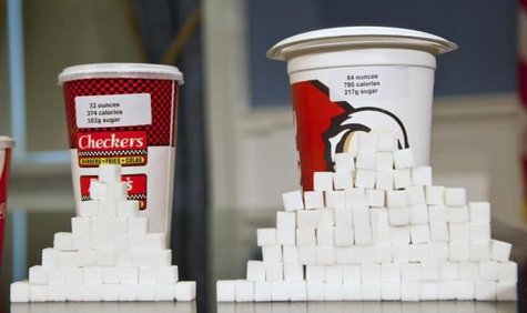 Soft drink cups sized (L-R) at 32 ounces and 64 ounces are displayed at a news conference at City Hall in New York, May 31, 2012.
CREDIT: REUTERS/ANDREW BURTON Soft drink cups sized (L-R) at 32 ounces and 64 ounces are displayed at a news conference at City Hall in New York, May 31, 2012.
CREDIT: REUTERS/ANDREW BURTON