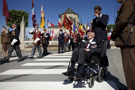 British World War II veteran Major Hugh Pond, 91, who served in the 9th Parachute Regiment, attends a ceremony at the municipal cemetery in Ranville, northern France June 6, 2014.
REUTERS/Benoit Tessier British World War II veteran Major Hugh Pond, 91, who served in the 9th Parachute Regiment, attends a ceremony at the municipal cemetery in Ranville, northern France June 6, 2014.
REUTERS/Benoit Tessier