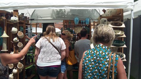 Many booths were filled with folks looking at the handcrafted works. Many booths were filled with folks looking at the handcrafted works.