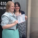 Natalie, left, and Heather Starr pose in front of the Outagamie County Administration Building in Appleton with their marriage license June 9, 2014. The Starrs were the first same-sex couple to be legally married in Outagamie County. (Photo from: FOX 11.) Natalie, left, and Heather Starr pose in front of the Outagamie County Administration Building in Appleton with their marriage license June 9, 2014. The Starrs were the first same-sex couple to be legally married in Outagamie County. (Photo from: FOX 11.)