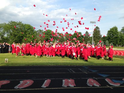 Members of the Coldwater High School Class of 2014 toss their caps at the end of graduation ceremonies held June 8, 2014, at Cardinal Field. Members of the Coldwater High School Class of 2014 toss their caps at the end of graduation ceremonies held June 8, 2014, at Cardinal Field.
