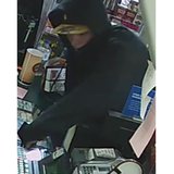 Surveillance image from the June 2, 2014, armed robbery of the U-Pump Citgo, 1233 Velp Ave. (Photo from: Green Bay Police Department). Surveillance image from the June 2, 2014, armed robbery of the U-Pump Citgo, 1233 Velp Ave. (Photo from: Green Bay Police Department).