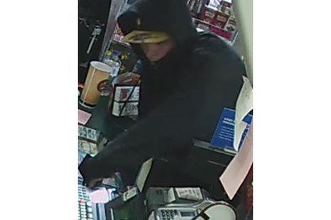 Surveillance image from the June 2, 2014, armed robbery of the U-Pump Citgo, 1233 Velp Ave. (Photo from: Green Bay Police Department). Surveillance image from the June 2, 2014, armed robbery of the U-Pump Citgo, 1233 Velp Ave. (Photo from: Green Bay Police Department).