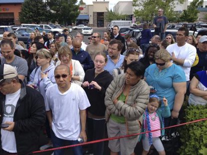 Parents wait behind police tape for students from Reynolds High School to arrive by bus in Troutdale, Oregon June 10, 2014.
CREDIT: REUTERS/STEVE DIPAOLA Parents wait behind police tape for students from Reynolds High School to arrive by bus in Troutdale, Oregon June 10, 2014.
CREDIT: REUTERS/STEVE DIPAOLA