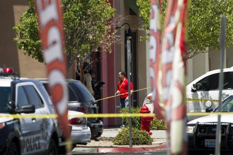 Metro Police officers stand outside a CiCi's Pizza shop after a shooting in Las Vegas June 8, 2014.
CREDIT: REUTERS/LAS VEGAS SUN/STEVE MARCUS Metro Police officers stand outside a CiCi's Pizza shop after a shooting in Las Vegas June 8, 2014.
CREDIT: REUTERS/LAS VEGAS SUN/STEVE MARCUS