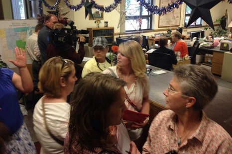 The scene at the Winnebago County Clerk's Office in Oshkosh, June 11, 2014, after the clerk decided to accept applications for marriage licenses from same-sex couples. (Photo from: FOX 11). The scene at the Winnebago County Clerk's Office in Oshkosh, June 11, 2014, after the clerk decided to accept applications for marriage licenses from same-sex couples. (Photo from: FOX 11).