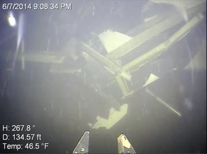 Picture taken from video of the wreckage of Saturday morning's plane crash into Lake Superior. Video released by the St. Louis County Sheriff's Office Picture taken from video of the wreckage of Saturday morning's plane crash into Lake Superior. Video released by the St. Louis County Sheriff's Office