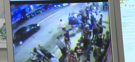 Green Bay Police reviewing video of a downtown disturbance outside several bars on June 7, 2014. (Photo from: FOX 11/YouTube). Green Bay Police reviewing video of a downtown disturbance outside several bars on June 7, 2014. (Photo from: FOX 11/YouTube).
