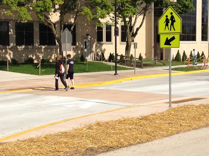 A view of a speed table/raised crosswalk outside the Y. A view of a speed table/raised crosswalk outside the Y.