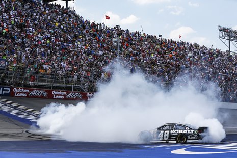 Jimmie Johnson performs his post-race burnout after winning the NASCAR Quicken Loans 400 at Michigan International Speedway June 15, 2014 Jimmie Johnson performs his post-race burnout after winning the NASCAR Quicken Loans 400 at Michigan International Speedway June 15, 2014
