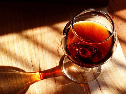 A glass of wine. A glass of wine.