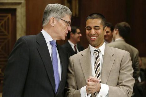 Federal Communications Commission (FCC) Chairman Tom Wheeler and FCC Commissioner Ajit Pai arrive to testify before a Senate Appropriations Financial Services and General Government Subcommittee hearing on the FY2015 budget justification for the FCC, on Capitol Hill in Washington March 27, 2014.
CREDIT: REUTERS/JONATHAN ERNST Federal Communications Commission (FCC) Chairman Tom Wheeler and FCC Commissioner Ajit Pai arrive to testify before a Senate Appropriations Financial Services and General Government Subcommittee hearing on the FY2015 budget justification for the FCC, on Capitol Hill in Washington March 27, 2014.
CREDIT: REUTERS/JONATHAN ERNST