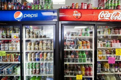 Cans of soda are displayed in a case. February 13, 2014. Credit: Reuters/Sam Hodgson Cans of soda are displayed in a case. February 13, 2014. Credit: Reuters/Sam Hodgson