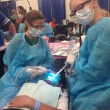 Dr Heidi and Breanna are having a great day providing free dental care at mission of mercy in Green Bay on June 27, 2014. (Photo from: WDA/Facebook). Dr Heidi and Breanna are having a great day providing free dental care at mission of mercy in Green Bay on June 27, 2014. (Photo from: WDA/Facebook).