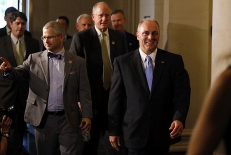 House Majority Whip candidate Steve Scalise (R) arrives with Rep. Patrick McHenry (L) for House Republican leadership elections in the Longworth House Office Building on Capitol Hill in Washington, June 19, 2014.
CREDIT: REUTERS/JIM BOURG House Majority Whip candidate Steve Scalise (R) arrives with Rep. Patrick McHenry (L) for House Republican leadership elections in the Longworth House Office Building on Capitol Hill in Washington, June 19, 2014.
CREDIT: REUTERS/JIM BOURG