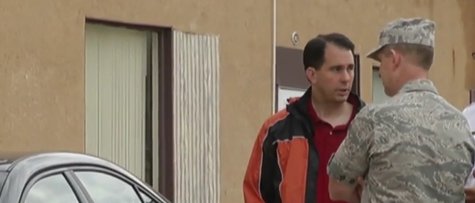 Governor Scott Walker tours storm damage in La Crosse on Monday June 30, 2014. (Photo from: FOX 11/YouTube). Governor Scott Walker tours storm damage in La Crosse on Monday June 30, 2014. (Photo from: FOX 11/YouTube).