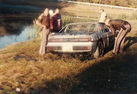Mindy's Fiero being examined by Vigo County Sheriff's Deputies Mindy's Fiero being examined by Vigo County Sheriff's Deputies