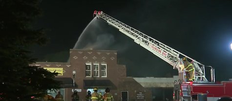 Fire crews respond to a fire at the Harbor Place Shoppes in Sturgeon Bay on Monday June 30, 2014. (Photo from: FOX 11/YouTube). Fire crews respond to a fire at the Harbor Place Shoppes in Sturgeon Bay on Monday June 30, 2014. (Photo from: FOX 11/YouTube).