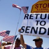 Protesters shouting anti-immigration slogans blocked the arrival of three buses carrying undocumented Central American families to a U.S. Border Patrol station. REUTERS/John Russell Protesters shouting anti-immigration slogans blocked the arrival of three buses carrying undocumented Central American families to a U.S. Border Patrol station. REUTERS/John Russell