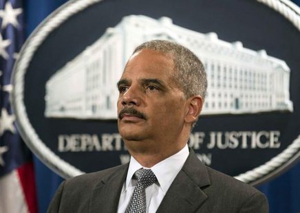 U.S. Attorney General Eric Holder stands during a news conference in Washington June 30, 2014.
CREDIT: REUTERS/JOSHUA ROBERTS U.S. Attorney General Eric Holder stands during a news conference in Washington June 30, 2014.
CREDIT: REUTERS/JOSHUA ROBERTS