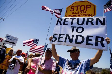 Demonstrators picket against the possible arrivals of undocumented migrants who may be processed at the Murrieta Border Patrol Station in Murrieta, California July 1, 2014.
CREDIT: REUTERS/SAM HODGSON Demonstrators picket against the possible arrivals of undocumented migrants who may be processed at the Murrieta Border Patrol Station in Murrieta, California July 1, 2014.
CREDIT: REUTERS/SAM HODGSON