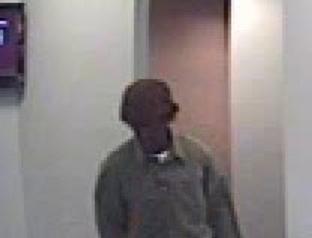 Surveillance Photo of the Kellogg Credit Union Bank Robber. Surveillance Photo of the Kellogg Credit Union Bank Robber.