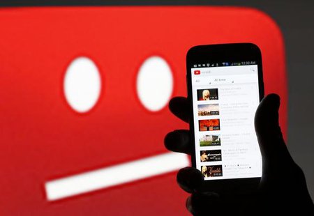 A picture illustration shows YouTube on a cell phone, in front of a YouTube copyright message regarding a video on an LCD screen, in central Bosnian town of Zenica, early June 18, 2014.
CREDIT: REUTERS/DADO RUVIC A picture illustration shows YouTube on a cell phone, in front of a YouTube copyright message regarding a video on an LCD screen, in central Bosnian town of Zenica, early June 18, 2014.
CREDIT: REUTERS/DADO RUVIC