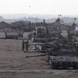 Israeli tanks and armoured personnel carriers (APCs) are seen at a staging area outside the central Gaza Strip July 15, 2014. Credit: Reuters/Baz Ratner Israeli tanks and armoured personnel carriers (APCs) are seen at a staging area outside the central Gaza Strip July 15, 2014. Credit: Reuters/Baz Ratner